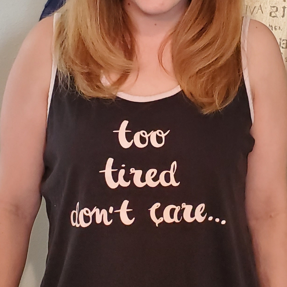 Shirt/pajama shirt says 'too tired, dont care'
